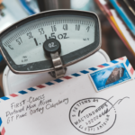 Understanding First-class postage cost of 1.15 oz